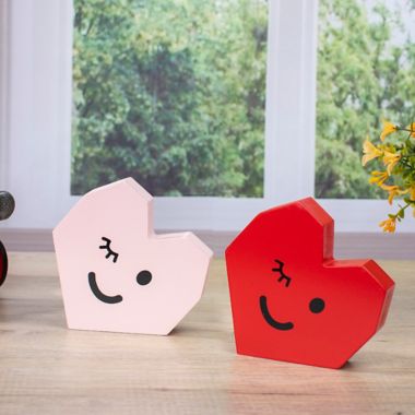 H for Happy&trade; Wooden Valentine's Day Winky Heart Decorative Accent in Red/Pink. View a larger version of this product image.