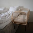 Alternate image 3 for Mushie Extra-Soft Muslin Crib Sheet Falling Stars