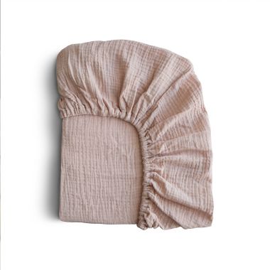 Mushie Extra-Soft Muslin Mini Crib Sheet in Blush. View a larger version of this product image.