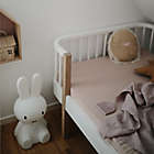 Alternate image 2 for Mushie Extra-Soft Muslin Mini Crib Sheet in Blush