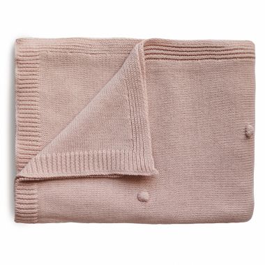 Mushie Knitted Textured Dots Baby Blanket in Blush. View a larger version of this product image.