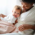 Alternate image 2 for Mushie Knitted Textured Dots Baby Blanket in Blush