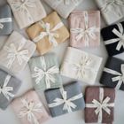 Alternate image 3 for Mushie Knitted Textured Dots Baby Blanket in Blush