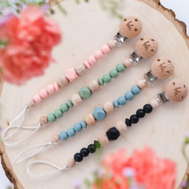 BooginHead&reg; PaciGrip Wood and Food-Grade Silicone Beaded Pacifier Clip in Sage. View a larger version of this product image.