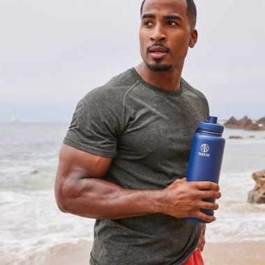 Takeya&reg; Actives 40 oz. Insulated Stainless Steel Water Bottle with Spout Lid in Onyx. View a larger version of this product image.