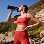 Alternate image 4 for Takeya&reg; Actives 24 oz. Insulated Stainless Steel Water Bottle with Spout Lid in Onyx