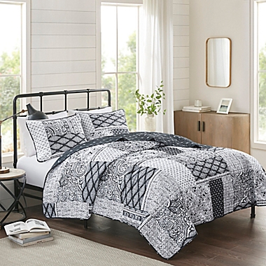 Madison Park&reg; Cassel 3-Piece Reversible King/California King Coverlet Set in Black. View a larger version of this product image.