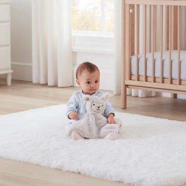 UGG&reg; Dawson 14-Inch Lamb Lovey in Birch. View a larger version of this product image.