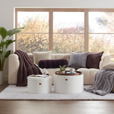 UGG&reg; Dawson Faux Fur 70-Inch x 50-Inch Throw Blanket in Lodge. View a larger version of this product image.