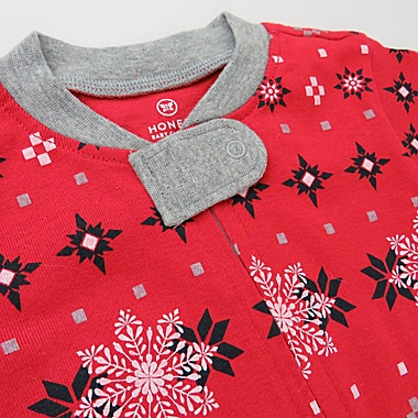 The Honest Company&reg; Size 0-3M Fair Isle Holiday Organic Cotton Footed Pajama in Red. View a larger version of this product image.
