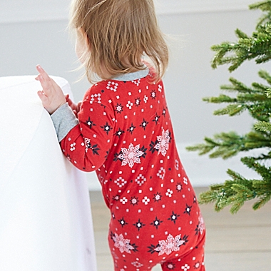 The Honest Company&reg; Size 6-9M Fair Isle Holiday Organic Cotton Footed Pajama in Red. View a larger version of this product image.