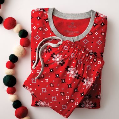 The Honest Company&reg; Size 0-3M Fair Isle Holiday Organic Cotton Footed Pajama in Red. View a larger version of this product image.
