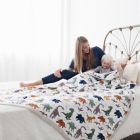 Alternate image 1 for Little Unicorn Dino Friends Cotton Muslin Quilted Throw