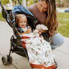 Alternate image 2 for Little Unicorn Safari Social Deluxe Muslin Baby Receiving Quilt in Orange