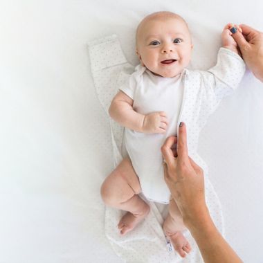 Swaddle Designs Size 0-3M Polka Dots Arms Up Half-Length Sleeves Transitional Swaddle Sack. View a larger version of this product image.