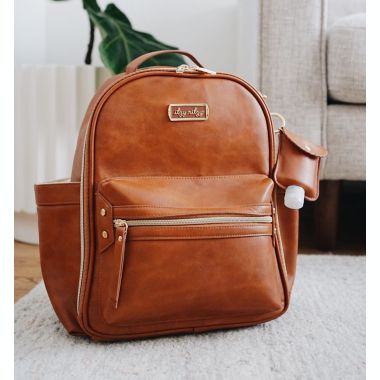 Itzy Ritzy&reg; Mini Backpack Diaper Bag in Cognac. View a larger version of this product image.