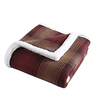 Eddie Bauer&reg; Nordic Plaid Polar Fleece Ultra Soft Plush Reversible Throw in Raisin. View a larger version of this product image.