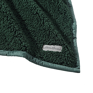 Eddie Bauer&reg; Solid Bi Colored Sherpa Fleece Reversible Throw in Dark Green. View a larger version of this product image.
