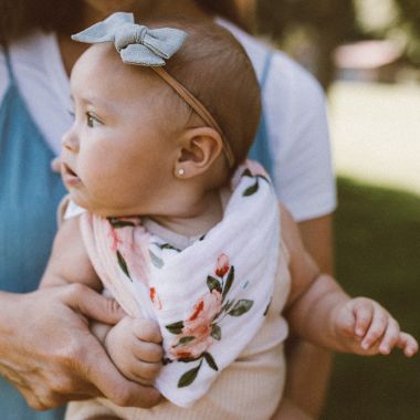 Little Unicorn&reg; 2-Pack Reversible Cotton Muslin Bandana Bibs. View a larger version of this product image.