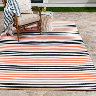 Simply Essential&trade; Coney Island 5' x 7' Indoor/Outdoor Area Rug in Orange. View a larger version of this product image.
