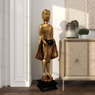 Ridge Road D&eacute;cor Standing Buddha Statue in Gold. View a larger version of this product image.