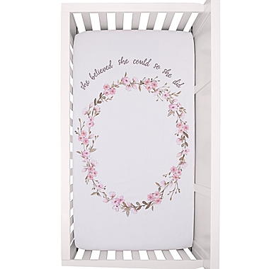 ever & ever&trade; Flower Fairy Photo-OP Fitted Crib Sheet in Pink. View a larger version of this product image.