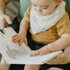 Alternate image 2 for Little Unicorn&reg; 2-Pack Cross Reversible Bandana Bibs in Taupe