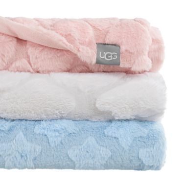 UGG&reg; Polar Carved Faux Fur Throw Blanket in Pink Hearts. View a larger version of this product image.