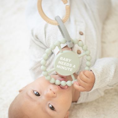 Bella Tunno&trade; "Baby Needs a Minute" Happy Teether in Green. View a larger version of this product image.