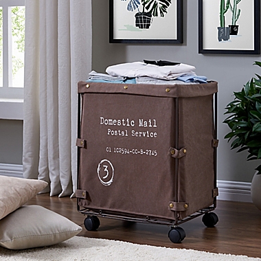 Danya B.&trade; Canvas Collapsible Rolling Hamper in Brown. View a larger version of this product image.
