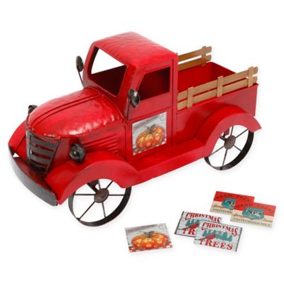 vintage metal red truck with christmas tree