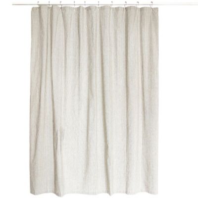 cream colored shower curtain