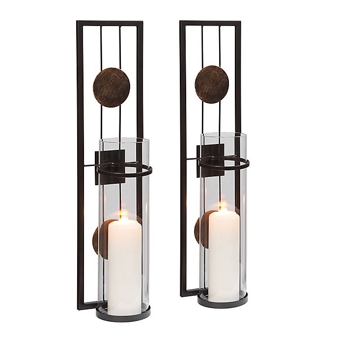 Kate and Laurel Curran Shield Metal Sconce Wall Candle Holder Black with Glass Pillar