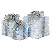 National Tree Company&reg; 3-Piece LED Illuminated Gift Boxes Lawn Ornament Set in White/Silver