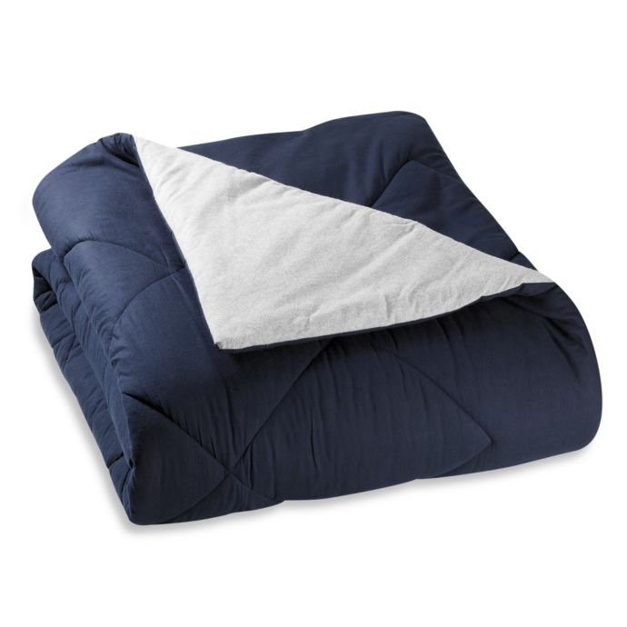 The Seasons Collection® Reversible Flannel Comforter in Navy/Gray Bed