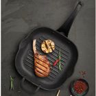 Alternate image 1 for Starfrit the Rock&trade; Nonstick 11-Inch Cast Iron Grill Pan with Helper Handle in Black