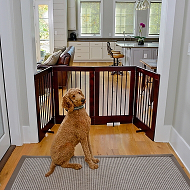 Cardinal Gates 4-Panel Freestanding Pet Gate in Walnut. View a larger version of this product image.