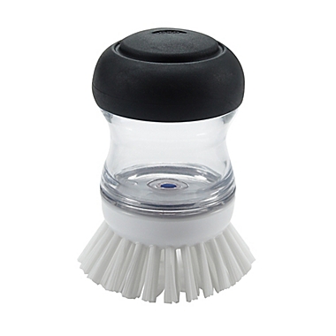 OXO Good Grips&reg; Soap Dispensing Palm Brush. View a larger version of this product image.