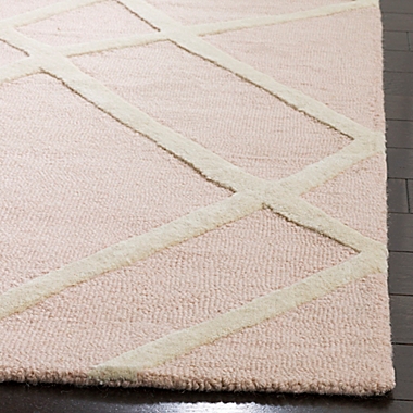 Safavieh Kids&reg; Shapes 5&#39; x 7&#39; Rug in Pink. View a larger version of this product image.