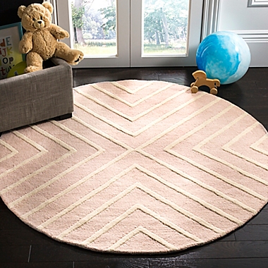 Safavieh Kids Diamonds 5&#39; Round Handcrafted Area Rug in Pink/Ivory. View a larger version of this product image.