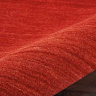 Calvin Klein Linear Glow 4&#39; x 6&#39; Area Rug in Sumac. View a larger version of this product image.