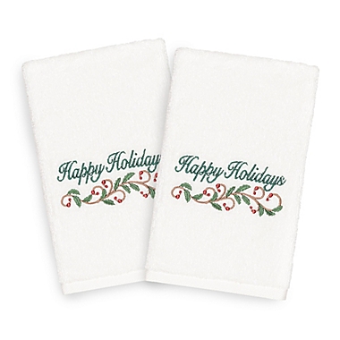 Linum Home Christmas Happy Holidays  2-Piece Hand Towel Set in White. View a larger version of this product image.