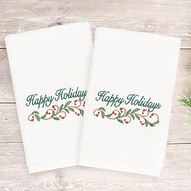 Linum Home Christmas Happy Holidays  2-Piece Hand Towel Set in White. View a larger version of this product image.