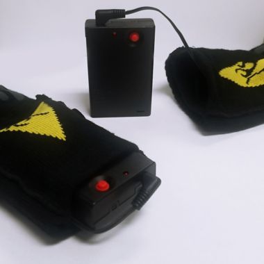 ActionHeat&trade; Unisex Small/Medium AA Battery Heated Socks in Black/Yellow. View a larger version of this product image.