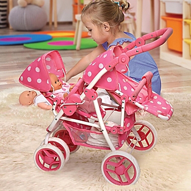 Badger Basket Polka Dot Double Doll Stroller in Pink. View a larger version of this product image.