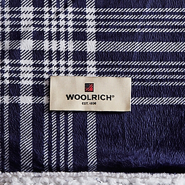 Woolrich&reg; Leeds Oversized Heated Mink/Berber Reversible Throw Blanket in Navy. View a larger version of this product image.