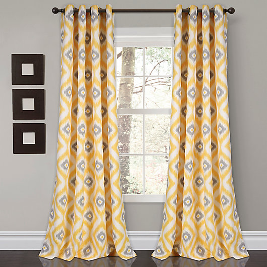Alternate image 1 for Diamond Ikat 84-Inch Grommet Room Darkening Window Curtain in Yellow (Set of 2)