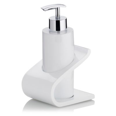 white liquid soap dispenser