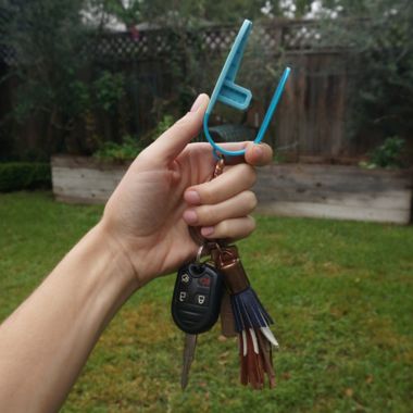 UnbuckleMe Car Seat Buckle Release Tool in Aqua. View a larger version of this product image.