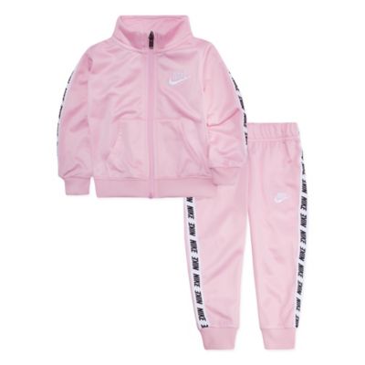 pink nike jacket with hearts